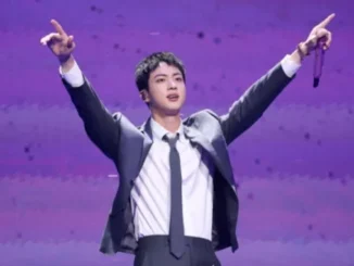 Jin, relayeur de la flamme à Paris